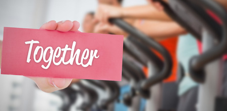 The word together and hand showing card againstの写真素材