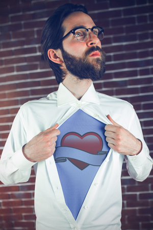 heart with scroll against thoughtful hipster opening shirt in superhero styleの写真素材