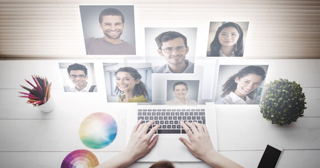 Profile pictures against overhead of hands tying in computerの写真素材