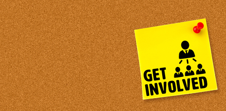 Get involved against digital image of pushpin on yellow paperの写真素材