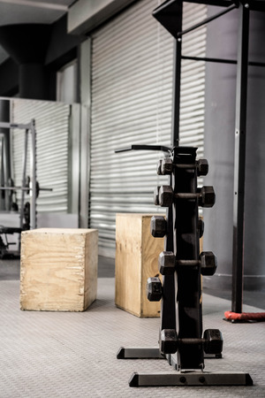 Dumbbell rack at the crossfit gymの写真素材