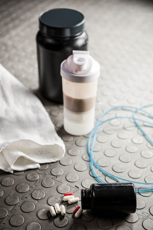 Supplements on the floor at the crossfit gymの写真素材