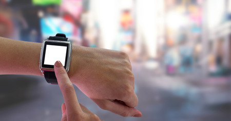 Smart Watch on wrist against blurry new york streetの写真素材