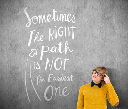 Portrait of confused hipster against white and grey backgroundの写真素材