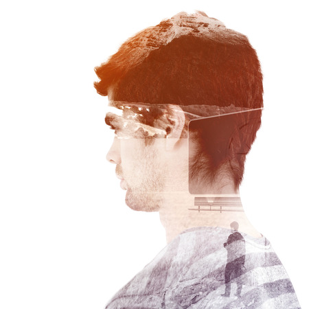 Side view of serious man against white background with vignetteの写真素材