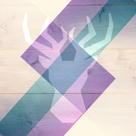 Black deer against colored woodの写真素材
