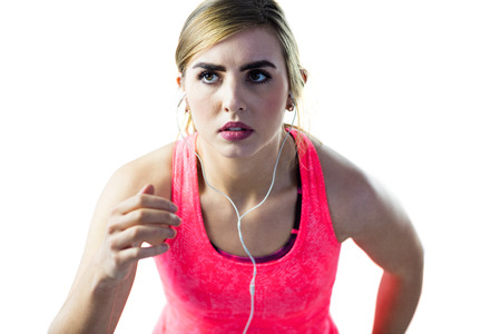 Woman jogging on white backgroundの写真素材