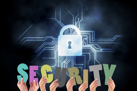 Hands holding security letter on lock on circuit board