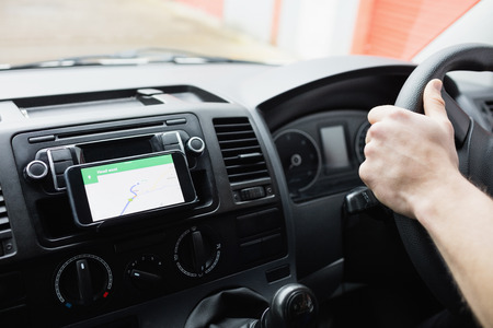 Man using his smartphone as navigation system