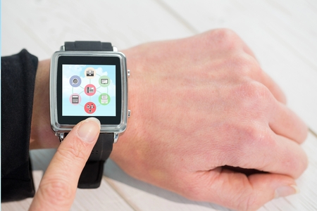 Digital composite of Woman using her smartwatch