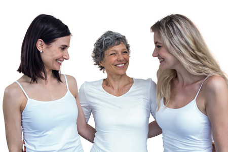 Women standing together with arm around on white background