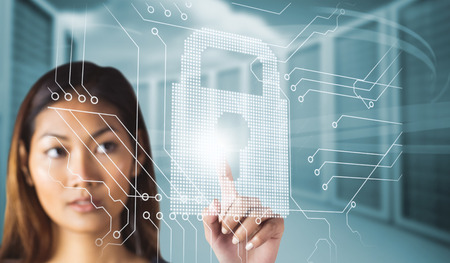 Businesswoman pointing  against composite image of server towers