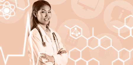 Asian doctor with arms crossed looking at the camera against medical iconsの写真素材