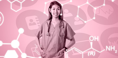 Confident surgeons with arms crossed in hospital against apps iconsの写真素材