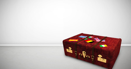 Suitcase with stickers against grey roomの写真素材