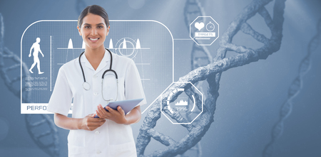 Happy doctor holding clipboard against view of dnaの写真素材