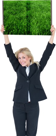 Woman holding up lawn book against white background