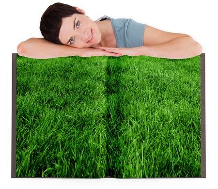 Woman with lawn book against white backgroundの写真素材