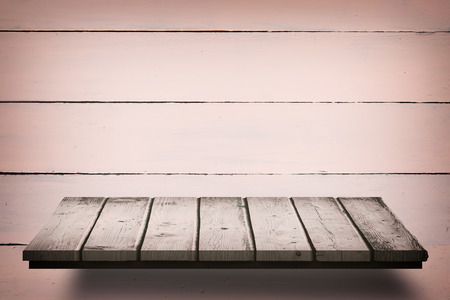 Wooden shelf against wooden wallの写真素材