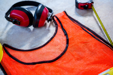 Carpenters safety equipment on a tableの写真素材