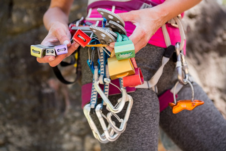 Close up climbing equipment on a woman