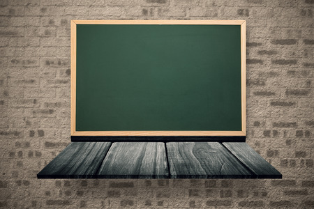 Image of a wooden board against stone wallの写真素材