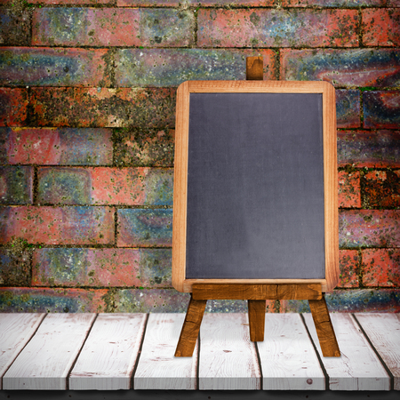 Image of a blackboard against brick wallの写真素材