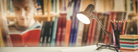 desk against man studyingの写真素材