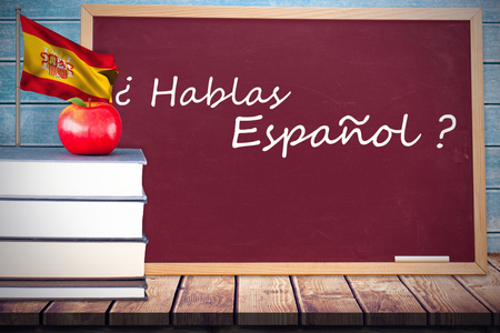 Digitally generated spain national flag against wooden planksの写真素材