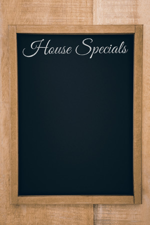 House specials message  against composite image of a slateの写真素材