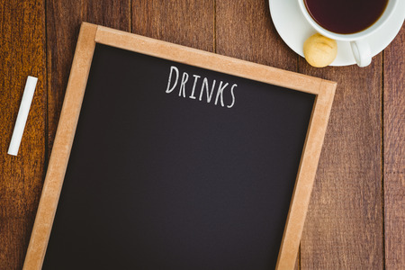 Drinks message against composite image of a slate with a coffee mugの写真素材