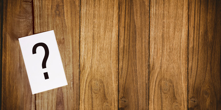 question mark against view of tissue on desk