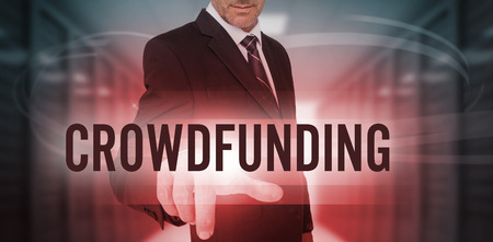 The word crowdfunding against white background against businessman touching futuristic red light...