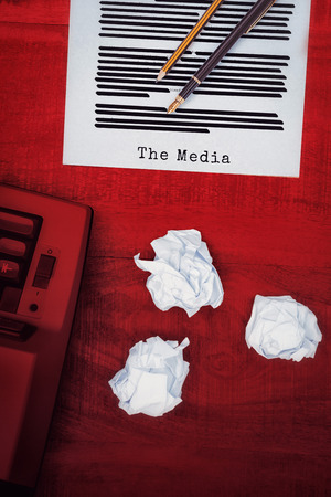 The media message  against view of an old typewriter and paperの写真素材