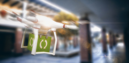 Shopping mall against digital image of a drone holding a cubeの写真素材