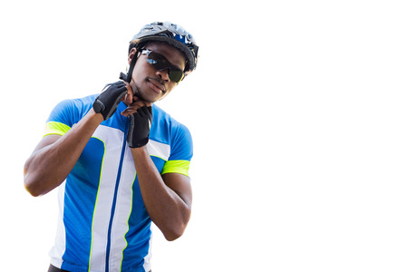Athletic man putting his cycling helmetの写真素材