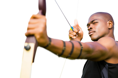 Front view of sportsman practising archeryの写真素材