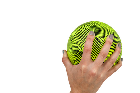 Sportswoman holding a ball on white backgroundの写真素材