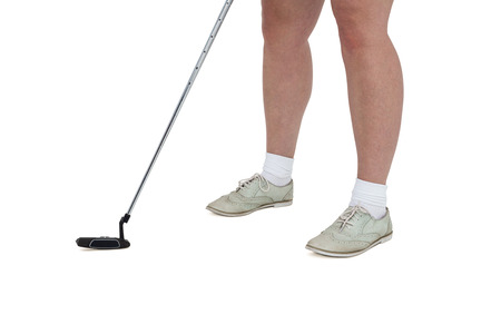 Golf player taking a shot on white backgroundの写真素材