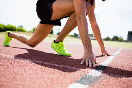 Athlete ready to run on running track