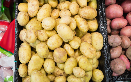 Close up of potatoes in a grocery shopの写真素材