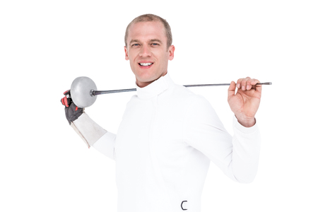 Portrait of swordsman holding fencing sword on white background