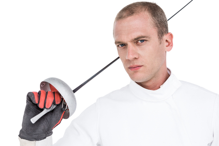 Portrait of swordsman holding fencing sword on white background