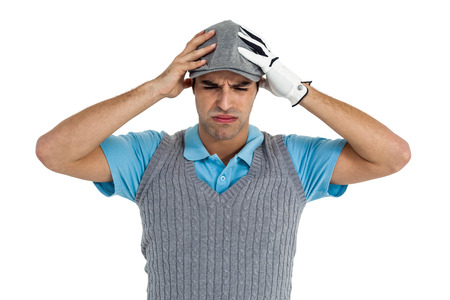 Frustrated golf player standing on isolated white backgroundの写真素材