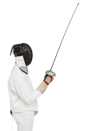 Man wearing fencing suit practicing with sword on white background