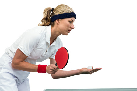 Female athlete playing table tennis on white backgroundの写真素材