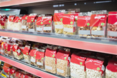 View of shelves with nuts in the supermarket