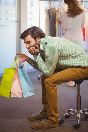 Man waiting for his wife in a mallの写真素材