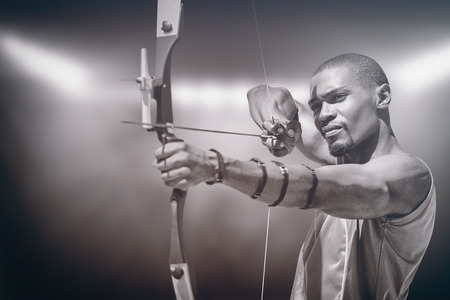 Close up view of man practicing archeryの写真素材