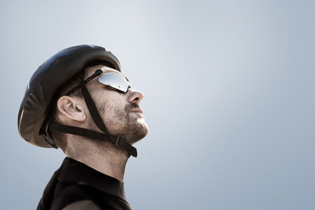 Man wearing a helmet against grey vignetteの写真素材